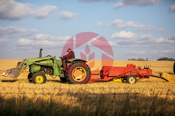 Hay Baler at a Barley Field
